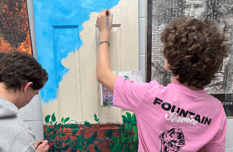  Students paint doors for springtime exhibit 